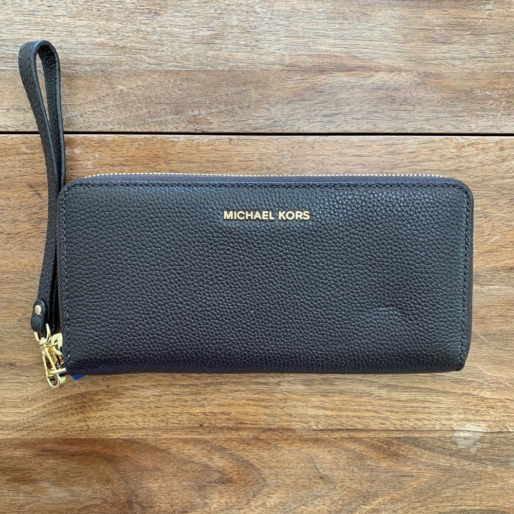 Michael Kors | Brown leather wristlet.